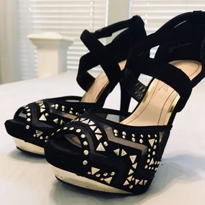 Gold accented black heels